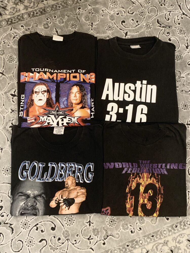 Vintage WWF wrestling tees — Austin 3:16, Goldberg